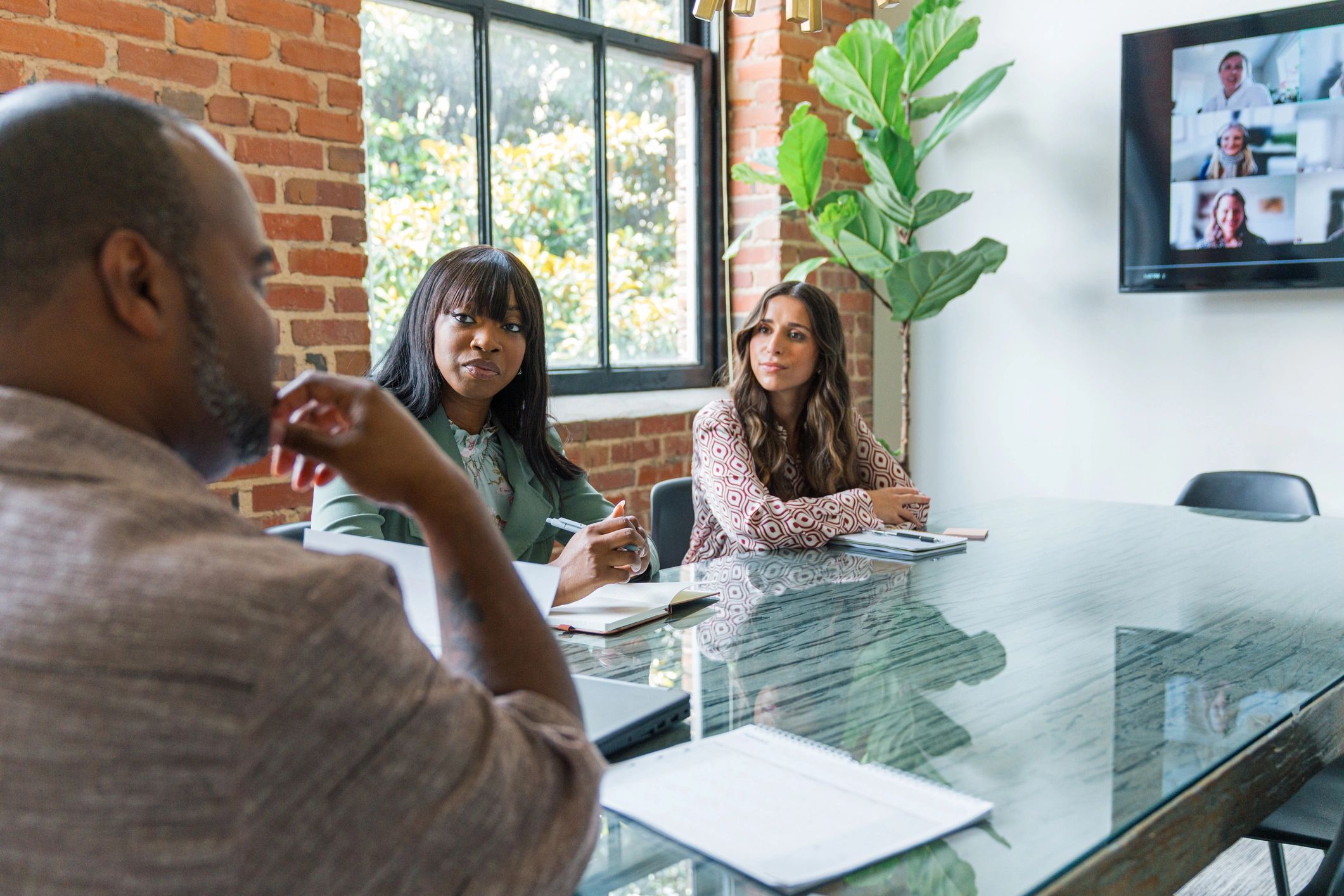 Small business finance team meeting in a modern office